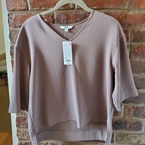 Beige Uniqlo top.